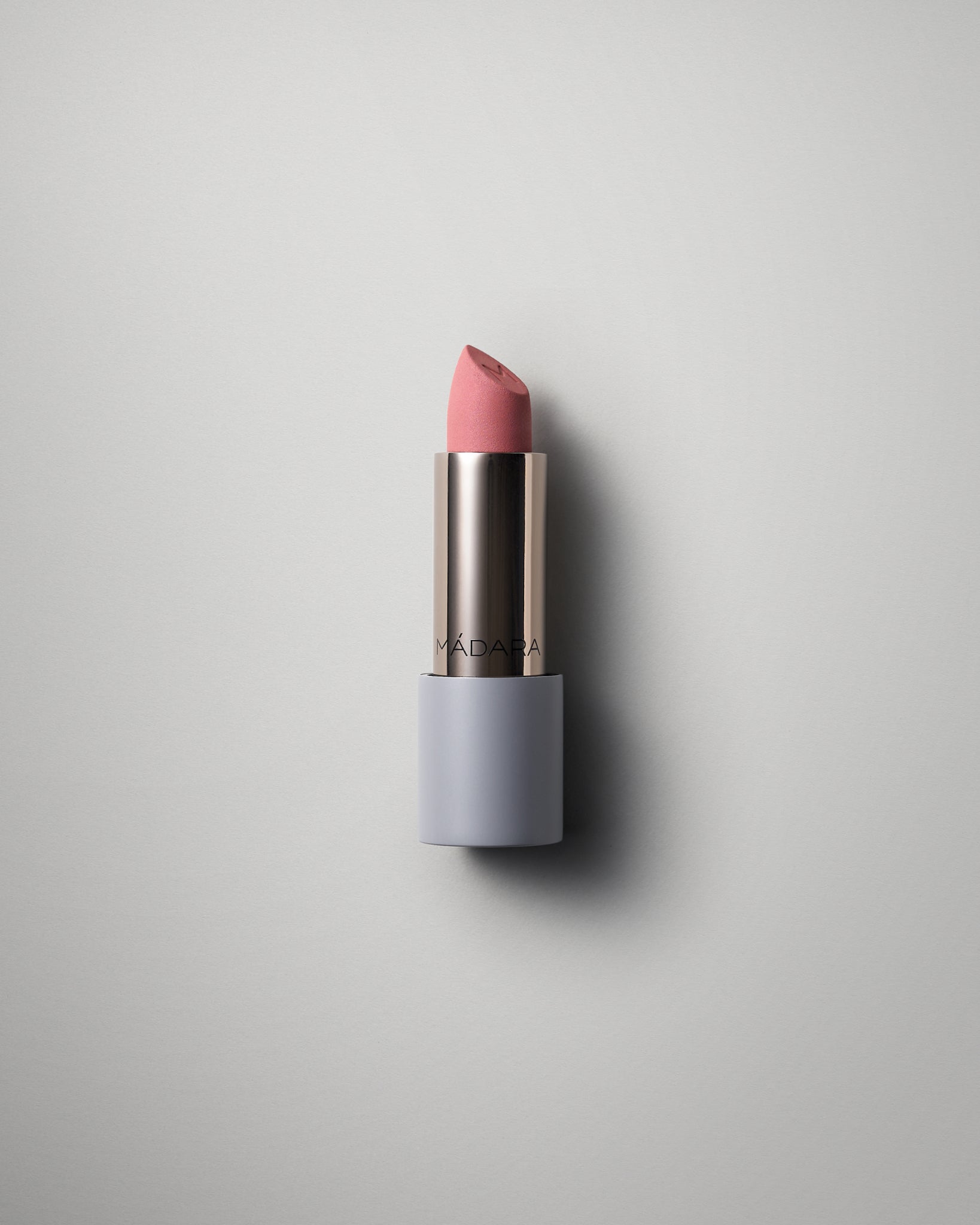 MΓDARA Organic Skincare matte cream lipstick cool nude A6301 face cream product photo on plain background.
