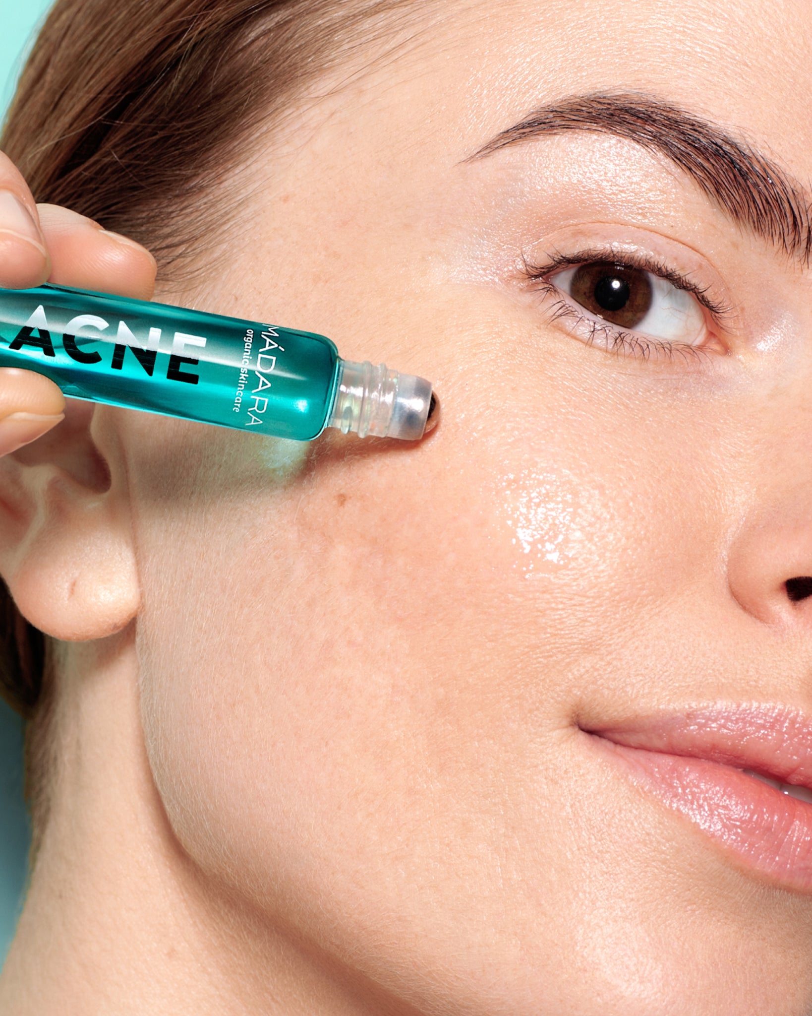 MΓDARA Organic Skincare acne spot roll on treatment N0025 product photo on plain background.